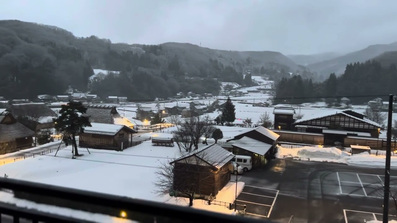 Behold the captivating view of Yuwaku Onsen from the tranquil serenity of the Ryoken.