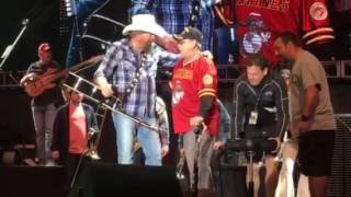 Toby Keith pulls up a marine vet during his encore performance