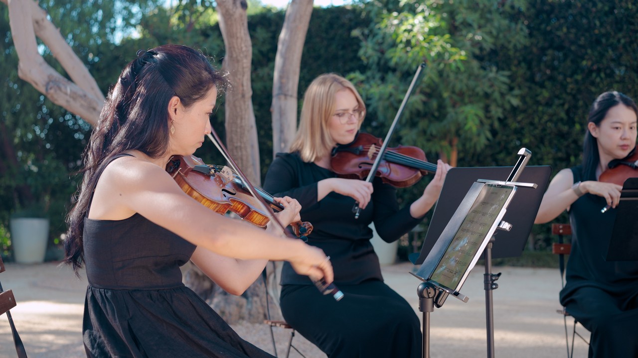Subito Strings performing Handel's Entrance of the Queen of Sheba outdoors, string quartet wedding processional