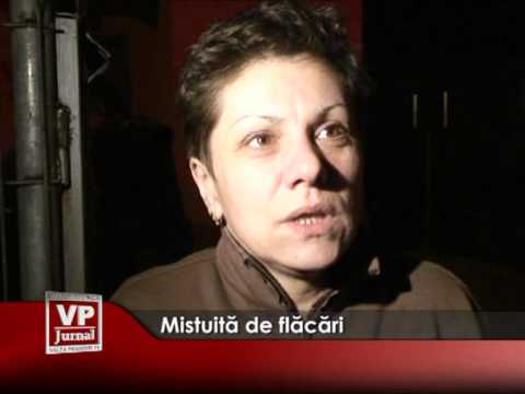 Mistuită de flăcări