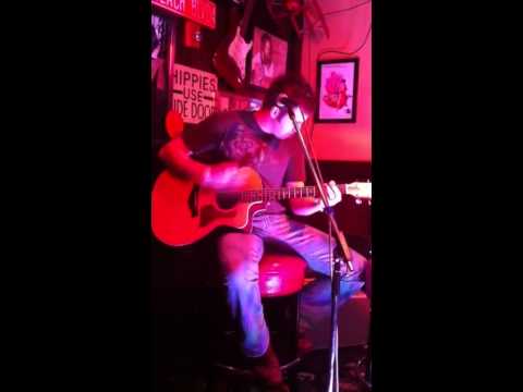 Travis Powell singing Whiskey Bent and Heaven Bound