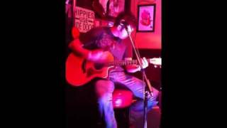 Travis Powell singing Whiskey Bent and Heaven Bound