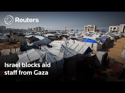 Israel blocks foreign aid staff from Gaza over new rules | REUTERS