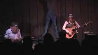 Lisa Loeb and Ben Peeler performing 