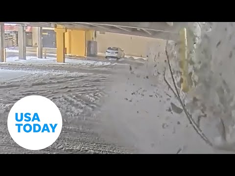 Parking garage roof collapses, barely misses vehicle | USA TODAY