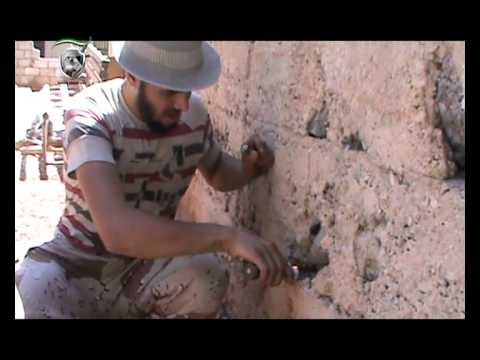 استهداف حاجز لقوات النظام بقنابل محلية الصنع من قبل الجيش الحر في المشفى الوطني في محافظة درعا