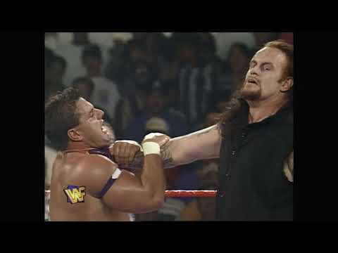 The Undertaker vs British Bulldog. Mankind interferes again & Undertaker gets counted out! (WWF)