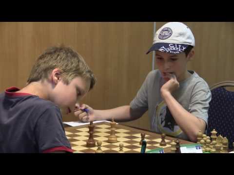 U15 7. 9.   Patrik Števík  - Šimon Šeleng 1/2:1/2