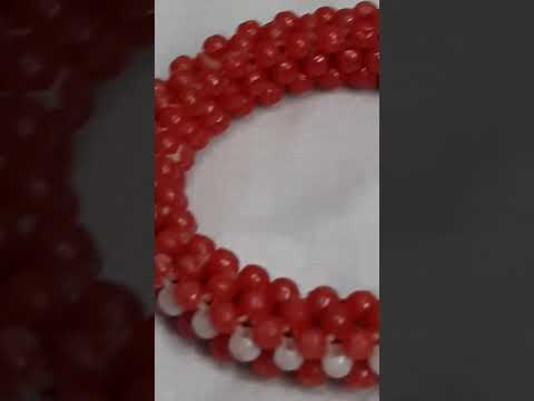 A pair of Bangle's -- made in bead's craft.