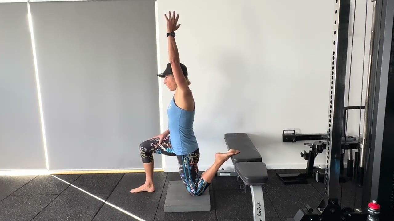 hip flexor warm up with overhead reach