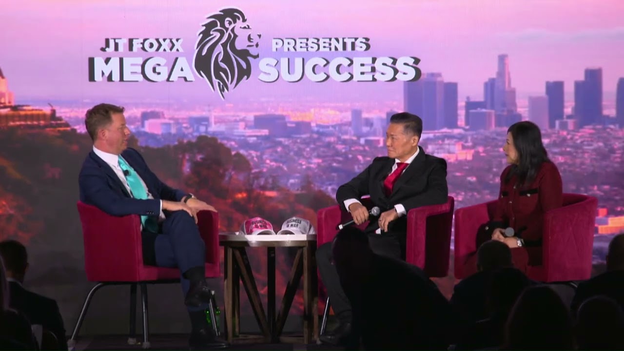 JT Foxx interviewing SHEKINAIH SIEW SIN YAP and J AARON K DAVID on the MegaSuccess stage, Los Angeles