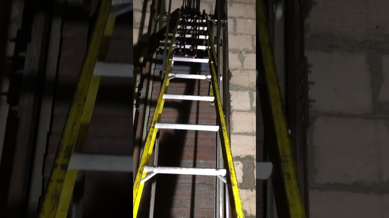 DEEP ELEVATOR PIT on a Ladder. Elevator Repair