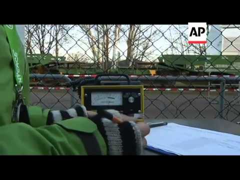 WRAP Nuclear waste train arrives, load transferred to truck, protest