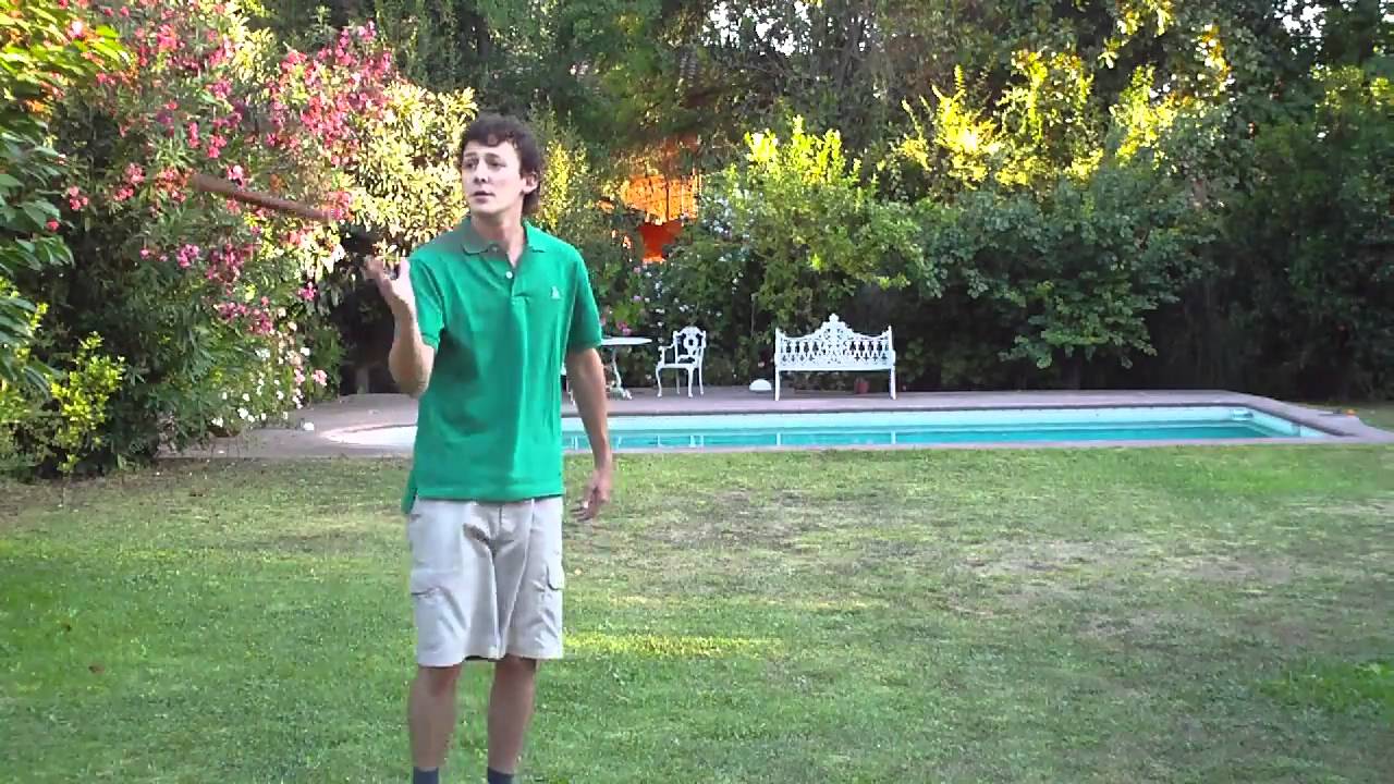 Under the near leg in spin nunchaku aerial