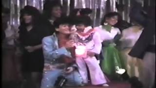 Little Elvis (Bruno Mars) performing with his uncle John Valentine and The Love Notes in 1990