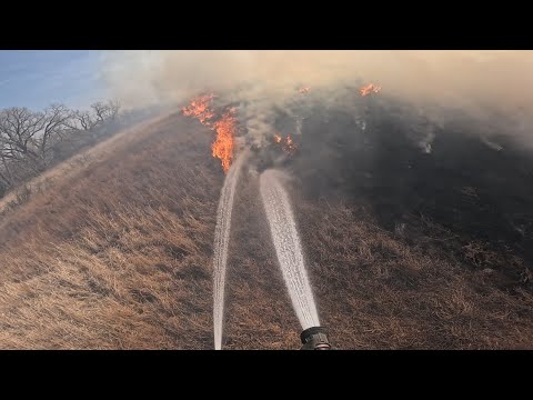 342 on a large grass fire helping Kanopolis