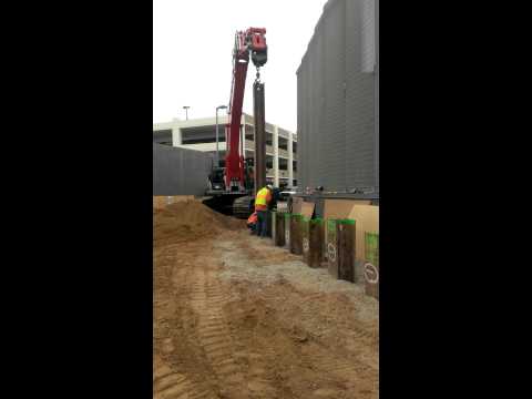 Setting shoring beams