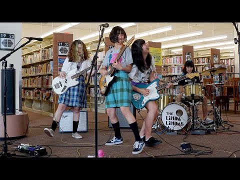 Watch This Teen Riot Grrrl Band Rage Against 'Racist, Sexist Boys' At The Los Angeles Public Library
