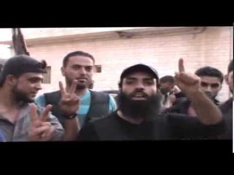 لواء الكرامة يقومون بتبديل المناوبات للمرابطة على جبهة كتيبة الشيلكا في بلدة عتمان ضمن معركة بوابة درعا