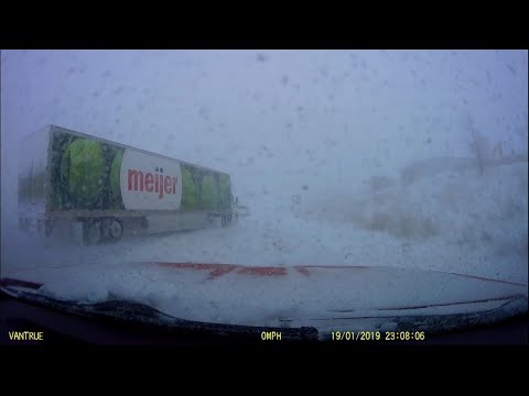 Witness recalls Meijer truck sliding into a car in Holland after losing control