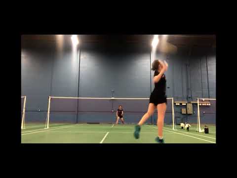 Emma Milner (9) wins a rally of badminton