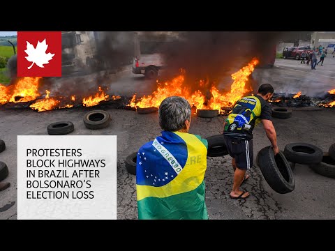 Highways blocked and Jair Bolsonaro silent after election defeat to Lula da Silva in Brazil