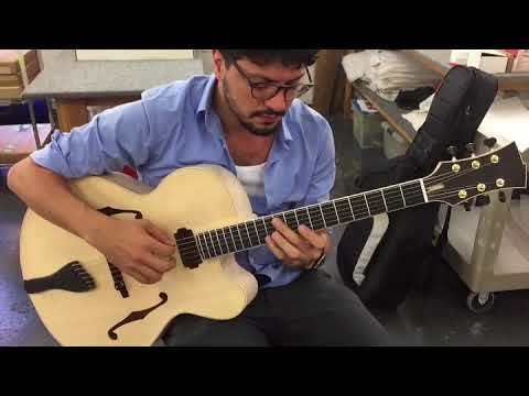 Pasquale Grasso playing an unfinished archtop Valle Guitar.