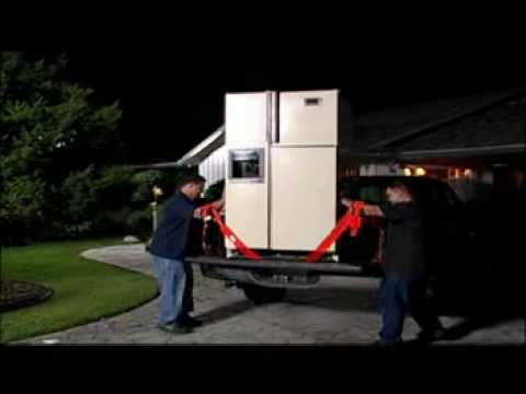 Part of a video titled The Forearm Forklift Lifting Straps® - Furniture And Appliance Moving ...