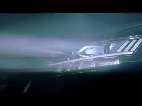 Matrix LED headlight with dynamic laser spot