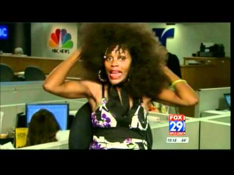 Upset black woman's afro gets searched by TSA for weapons