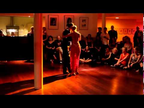  Michael Nadtochi  and  Eleonora Kalganova  are  dancing  to  a  tango