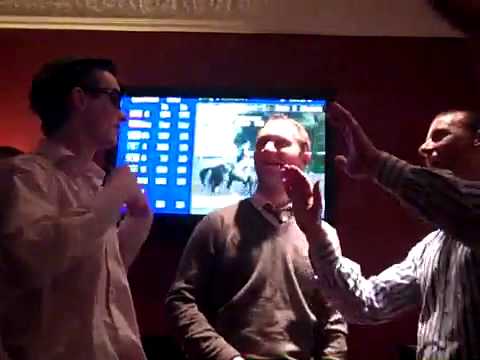 Michael Gallagher singing Sweet Caroline in Cheltenham 16/0