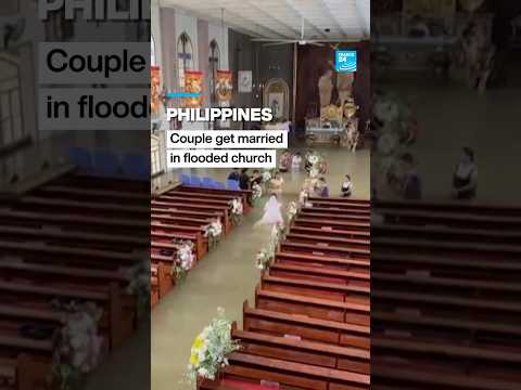 Philippine couple married in hip-deep floodwaters