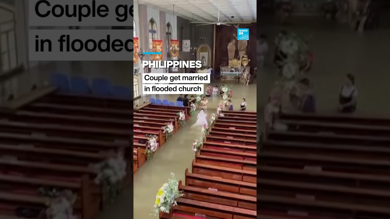 Philippine couple married in hip-deep floodwaters • FRANCE 24 English