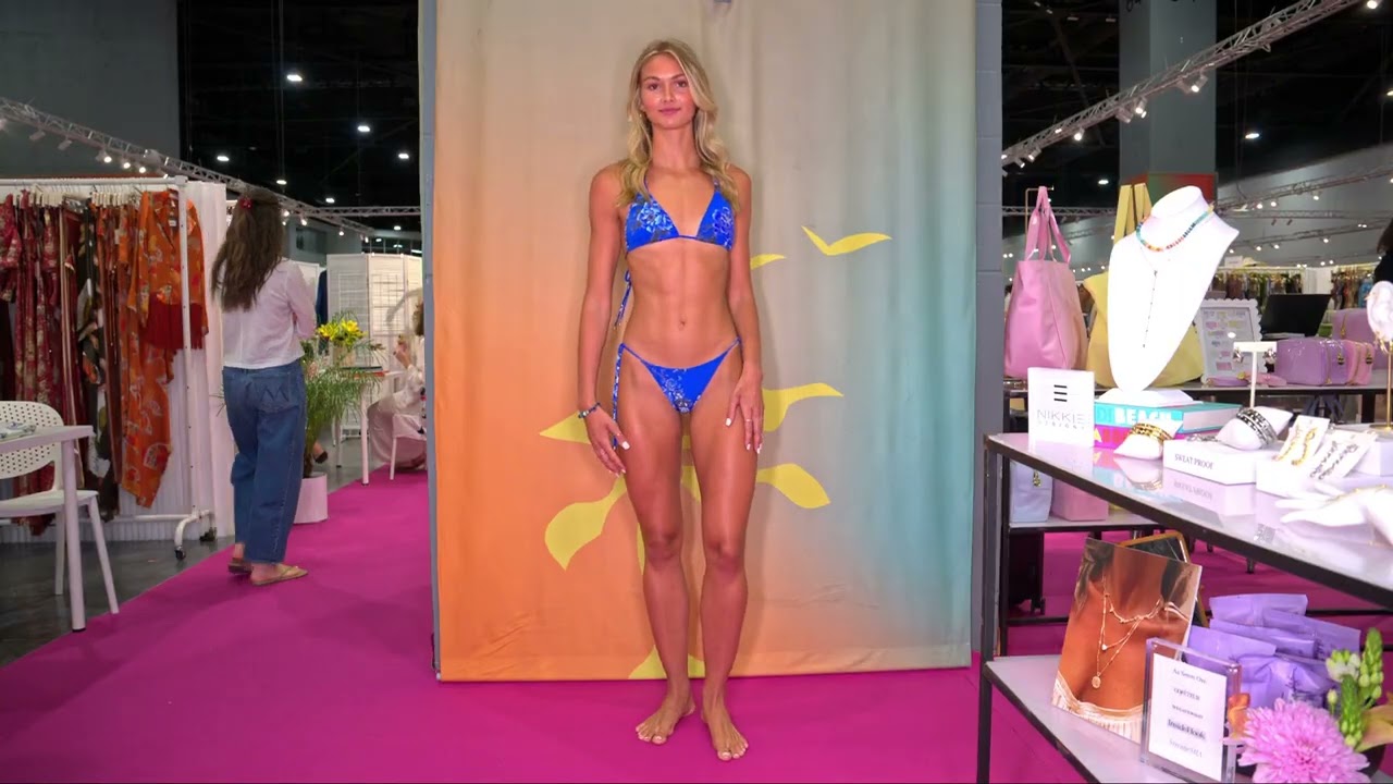 Swimsuit model Bella Deere poses in 1st Agua Clara at Cabana Swim Show / Miami Beach Conv. Center