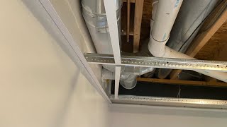 Drop Ceiling Grid Installation Hack. Avoid Crooked Grid Pattern for Main Beams Longer Than 12 feet.