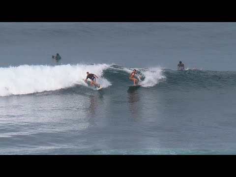 CLEAN WAVES TODAY, FREESURFERS SURFING AT ULUWATU.