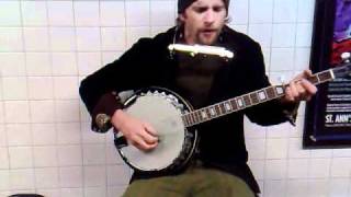Zack Orion on the banjo, while waiting for the G train