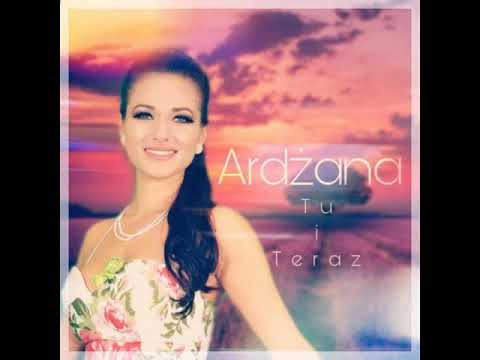 ADŻANA - TU I TERAZ