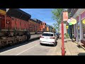 Street Running Trains Pass In LaGrange Yard, 1st Takes The Siding, Old Red ConRail Boxcars In Street