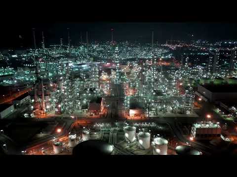 VideoVault Stock Video: Very Large Oil Refinery at Night Drone View