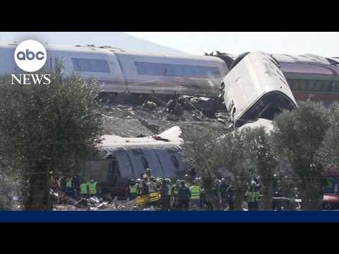At least 64 killed in train collision on high-speed line in Spain