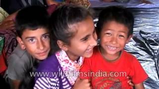 Cute happy kids despite stress of living in Darjeeling landslide relief camp