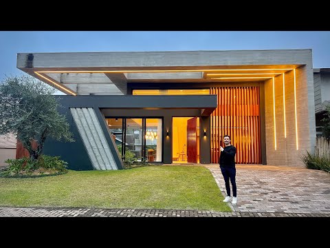 CASA TÉRREA COM 242M², COM 4 SUÍTES, FINAMENTE DECORADA À VENDA NO VELAS DA MARINA / RS! 