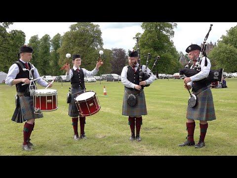 Stockbridge "A" Pipes & drums Quartet competing at Strathmore Highland Games, Scotland 2019