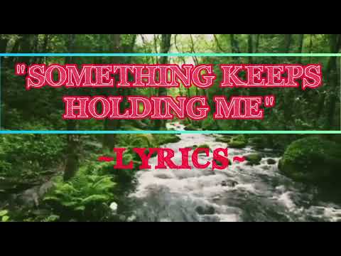 "SOMETHING KEEPS HOLDING ME" LYRICS VIDEO