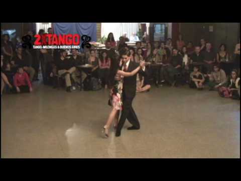  Maria Florencia Labiano  and  Hernán Rodriguez Chaile  are  dancing  to  the  tango  "  Bajo el Cono Azul  "