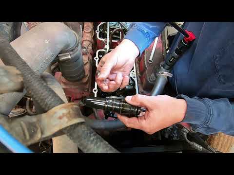 How to change injectors in a Cummins 855 small cam engine.