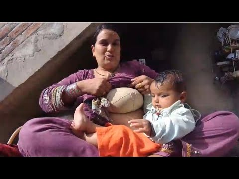 Feeding My Little Daughter While Managing Household Chores