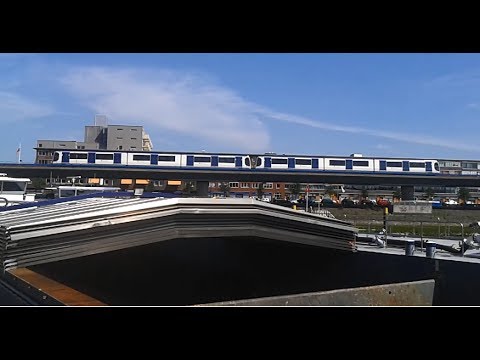 RET Metro 2*Type RSG3 vanuit Katendrecht van Rijnhaven naar Maashaven richting Slinge